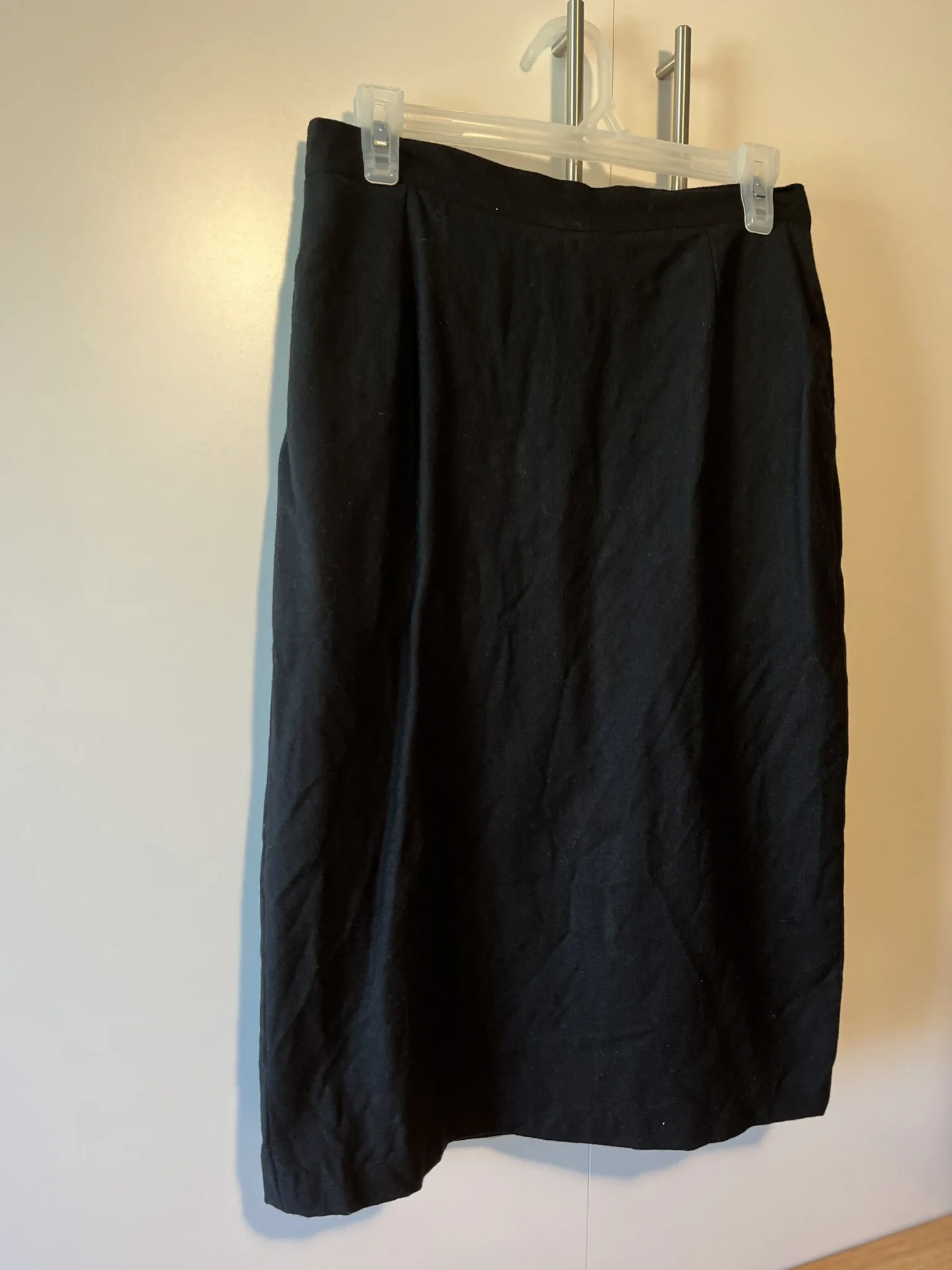 Featured image for Black mid-length skirt, size 8–10 – 100% wool – Made in Canada – Maxcella Priari Paris