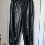 Featured thumbnail for Babaton trousers, size M, black faux leather, jogger-style