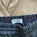 Thumbnail for Babaton trousers, size M, black faux leather, jogger-style