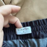 Thumbnail for Babaton trousers, size M, black faux leather, jogger-style