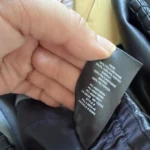 Thumbnail for Babaton trousers, size M, black faux leather, jogger-style