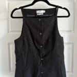 Featured thumbnail for Twik black sleeveless blouse with buttons