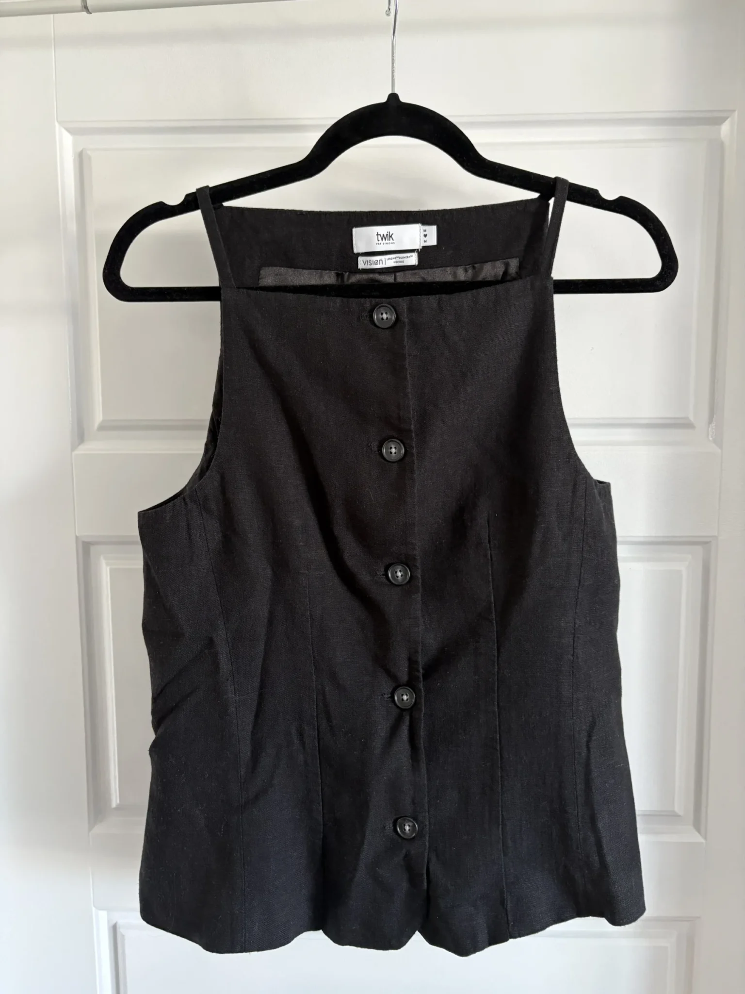 Featured image for Twik black sleeveless blouse with buttons