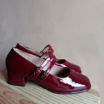 Featured thumbnail for Burgundy patent leather Mary Jane ballet flats