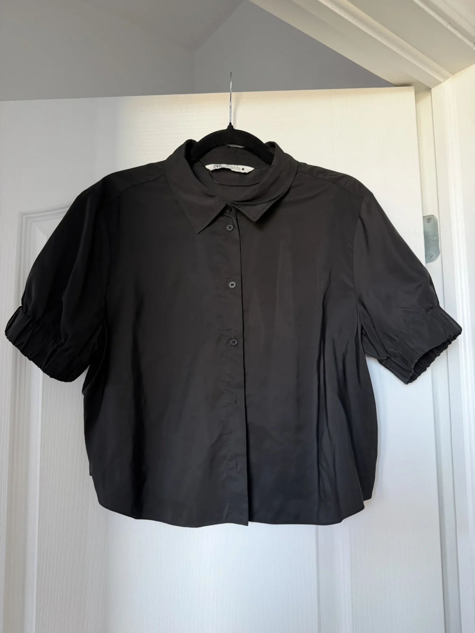 Featured image for Black short-sleeved Zara shirt