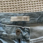 Thumbnail for Light blue jeans