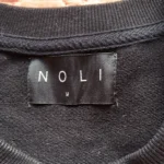 Thumbnail for NOLI – Black cropped yoga/athleisure top with fringing and rhinestones – M