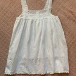 Thumbnail for THINGS BETWEEN – A flirty white babydoll dress with openwork lace and scalloped trim – G