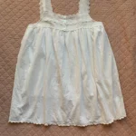 Thumbnail for THINGS BETWEEN – A flirty white babydoll dress with openwork lace and scalloped trim – G