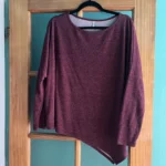 Featured thumbnail for Asymmetrical Long-Sleeved Jumper