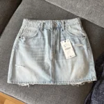 Featured thumbnail for Zara denim mini skirt