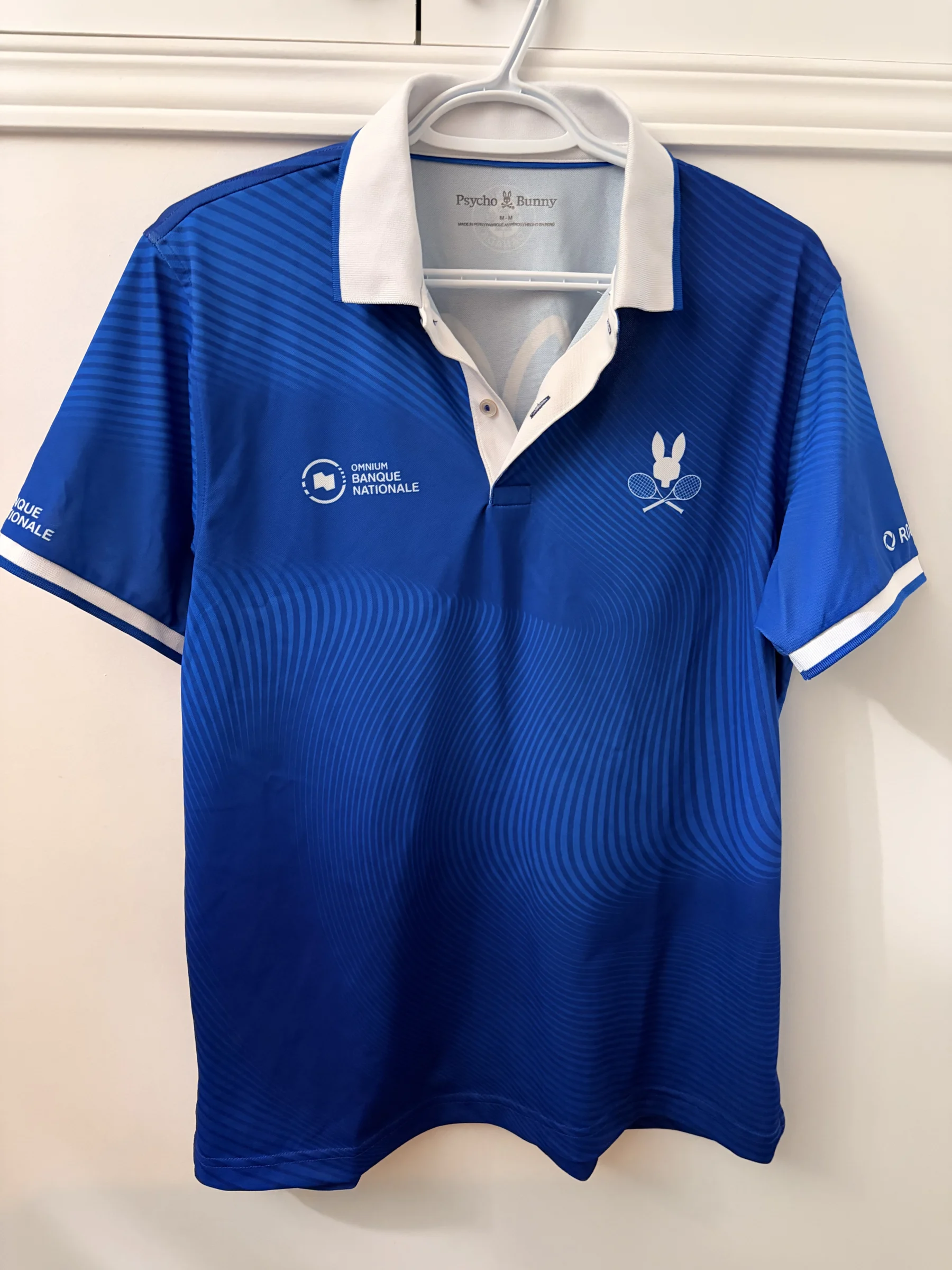 Official Omnium Banque Nationale 2026 Psycho Bunny polo shirt *Other seconde main