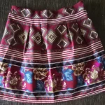 Featured thumbnail for Flared skirt with a floral pattern