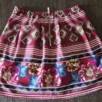 Thumbnail for Flared skirt with a floral pattern
