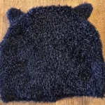 Featured thumbnail for Black ear-flap hat