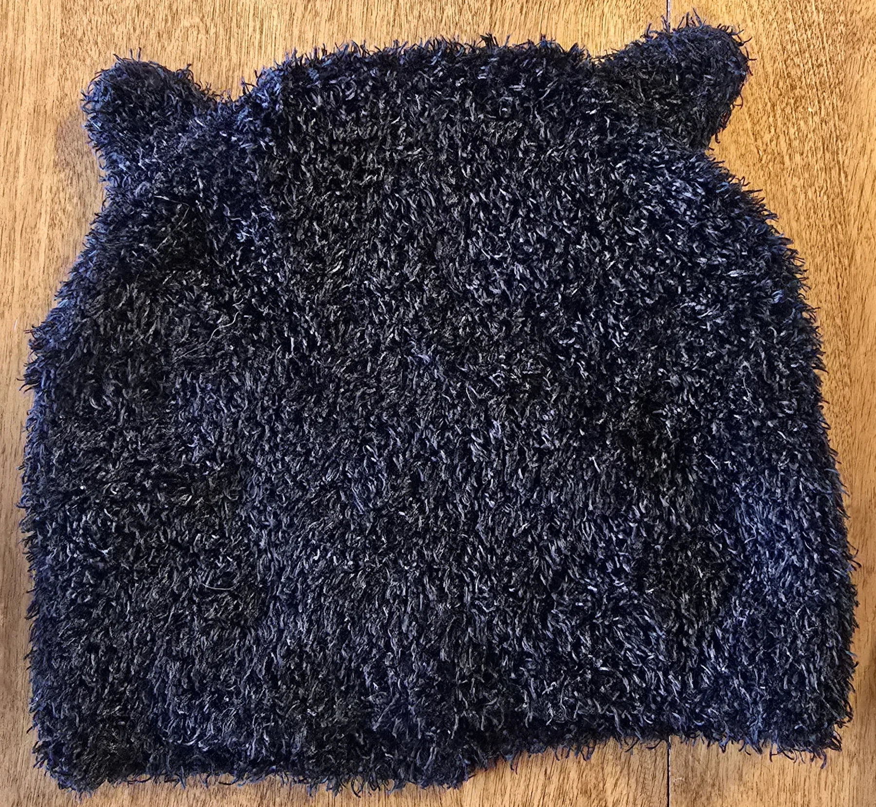 Black ear-flap hat *Other seconde main