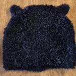 Thumbnail for Black ear-flap hat