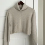 Featured thumbnail for Merino wool roll-neck jumper with a V-neck