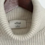 Thumbnail for Merino wool roll-neck jumper with a V-neck