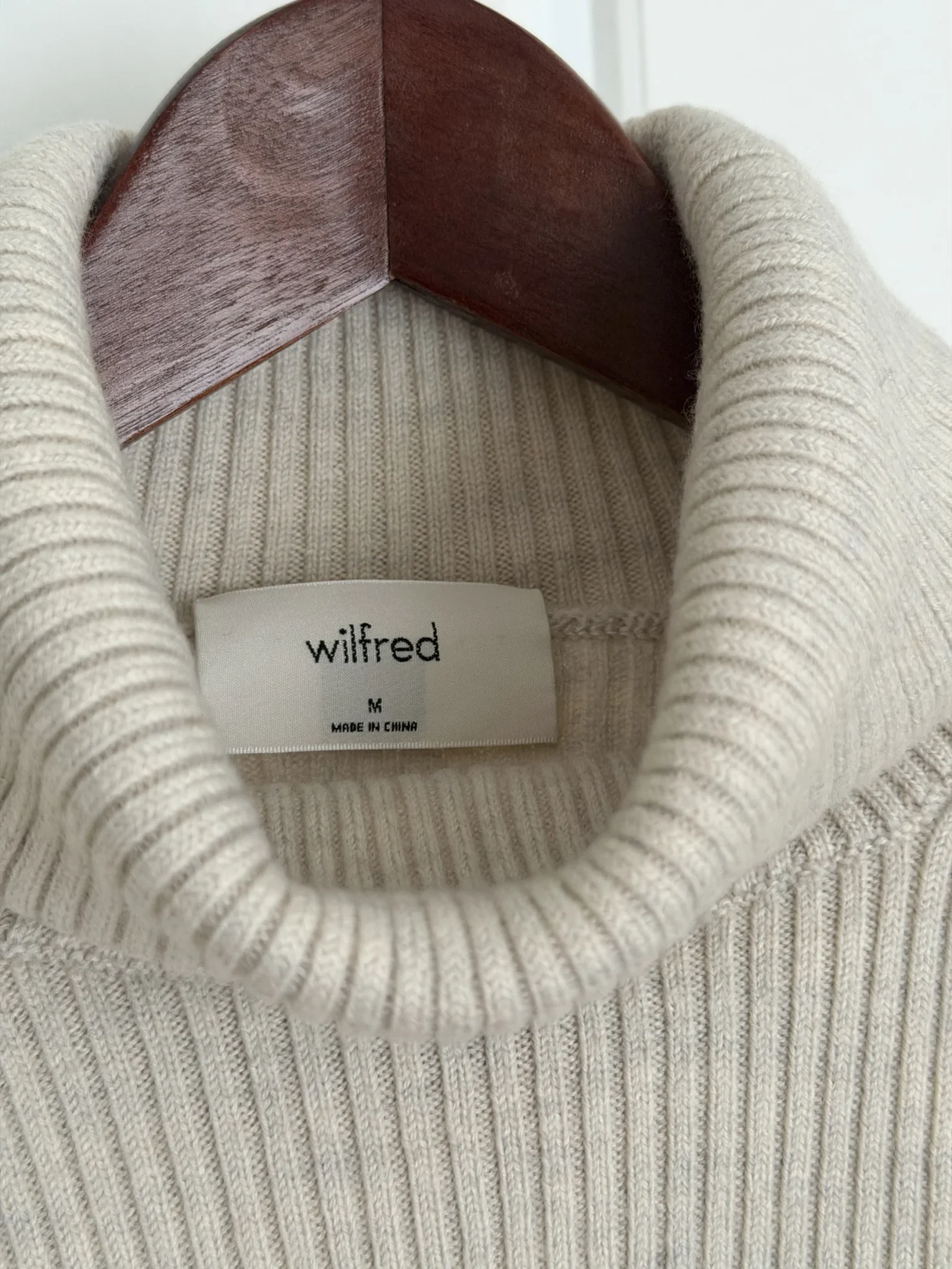 Image for Merino wool roll-neck jumper with a V-neck