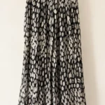Featured thumbnail for Kelly Bergin — long silk skirt with a black and ivory print — size 2