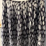 Thumbnail for Kelly Bergin — long silk skirt with a black and ivory print — size 2
