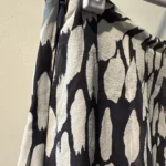 Thumbnail for Kelly Bergin — long silk skirt with a black and ivory print — size 2
