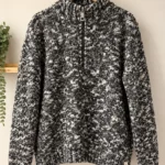 Featured thumbnail for WOOLRICH | Black and cream marl jumper with a zipped high neck