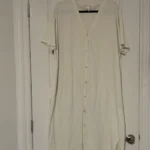 Featured thumbnail for Cream-coloured dress