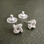Featured thumbnail for Boucles d’oreilles clous noeud pavé STELLA AND DOT