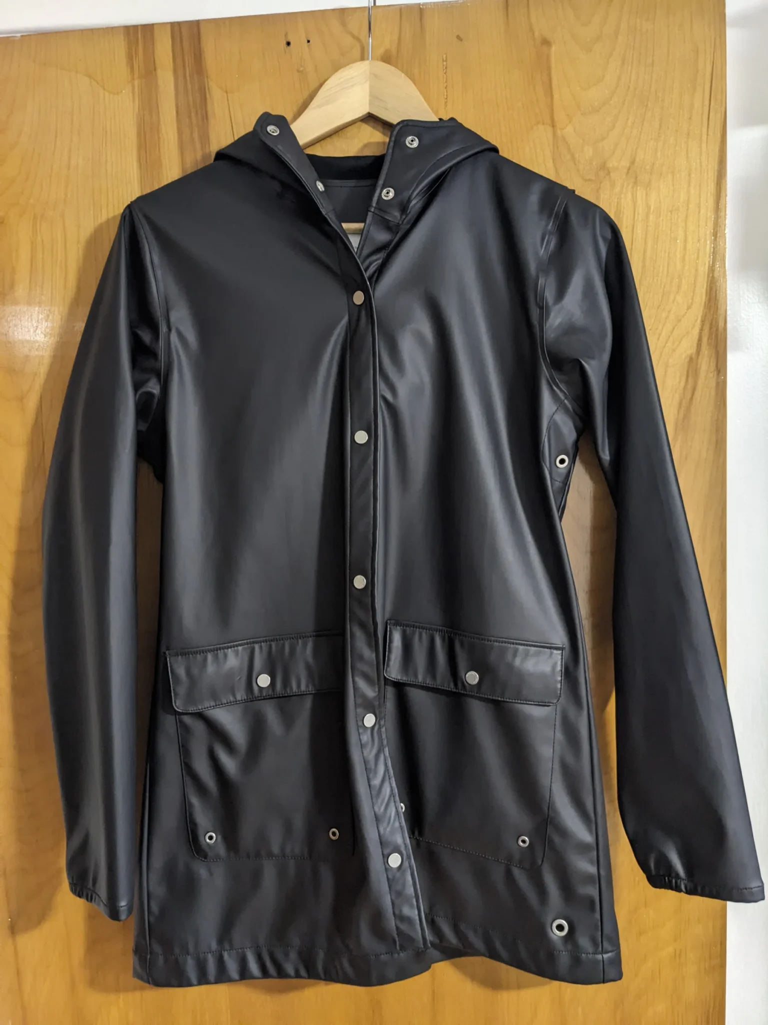 Featured image for Black Herschel raincoat