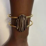 Featured thumbnail for Gold Bangle Bracelet with Cabochon and Geometric Lines