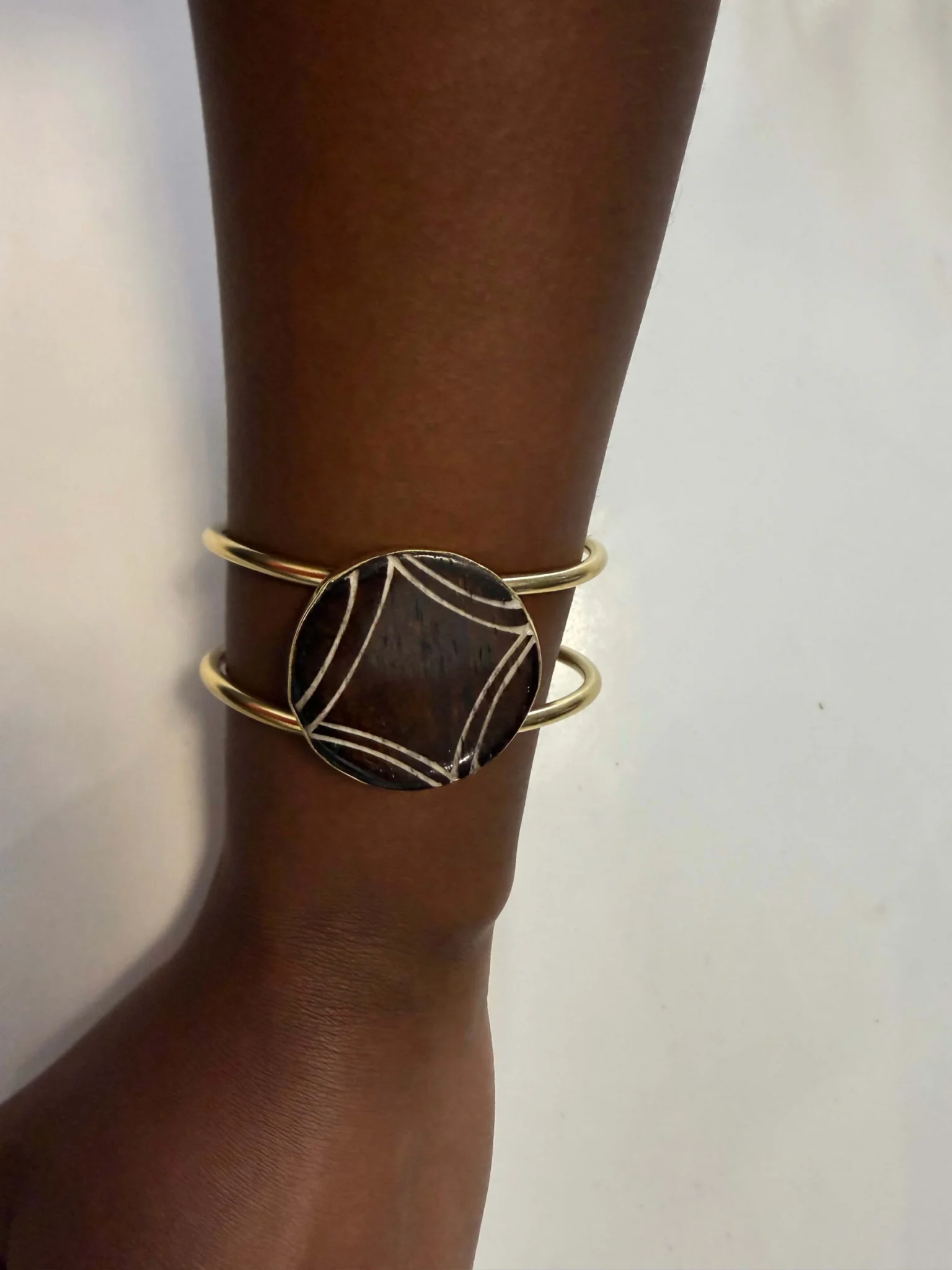 Featured image for Gold Bangle with Round Cabochon and Geometric Design