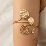 Featured thumbnail for Gold Spiral & Hammered Discs Arm Bracelet