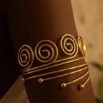 Featured thumbnail for Gold Multi-Spiral & Pearl Armband