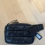 Featured thumbnail for Brand-new black Super Puff clutch bag