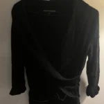 Featured thumbnail for Black jumper/top with a crossover neckline – size L