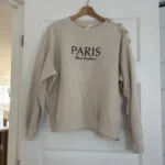 Featured thumbnail for Beige Paris H&M jumper