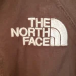 Thumbnail for Manteau The North Face 3-en-1 Triclimate HyVent , couche intérieure en polaire, brun et ivoire