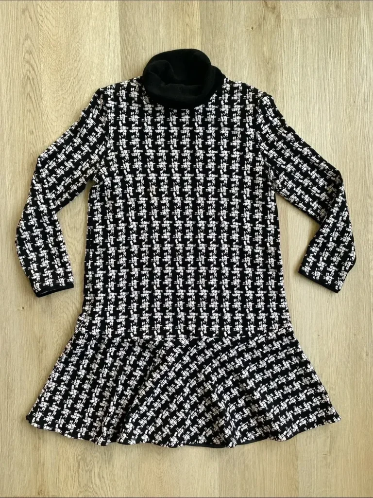 Featured image for Marc Cain Black White Knit Turtleneck Dress Flounce Hem