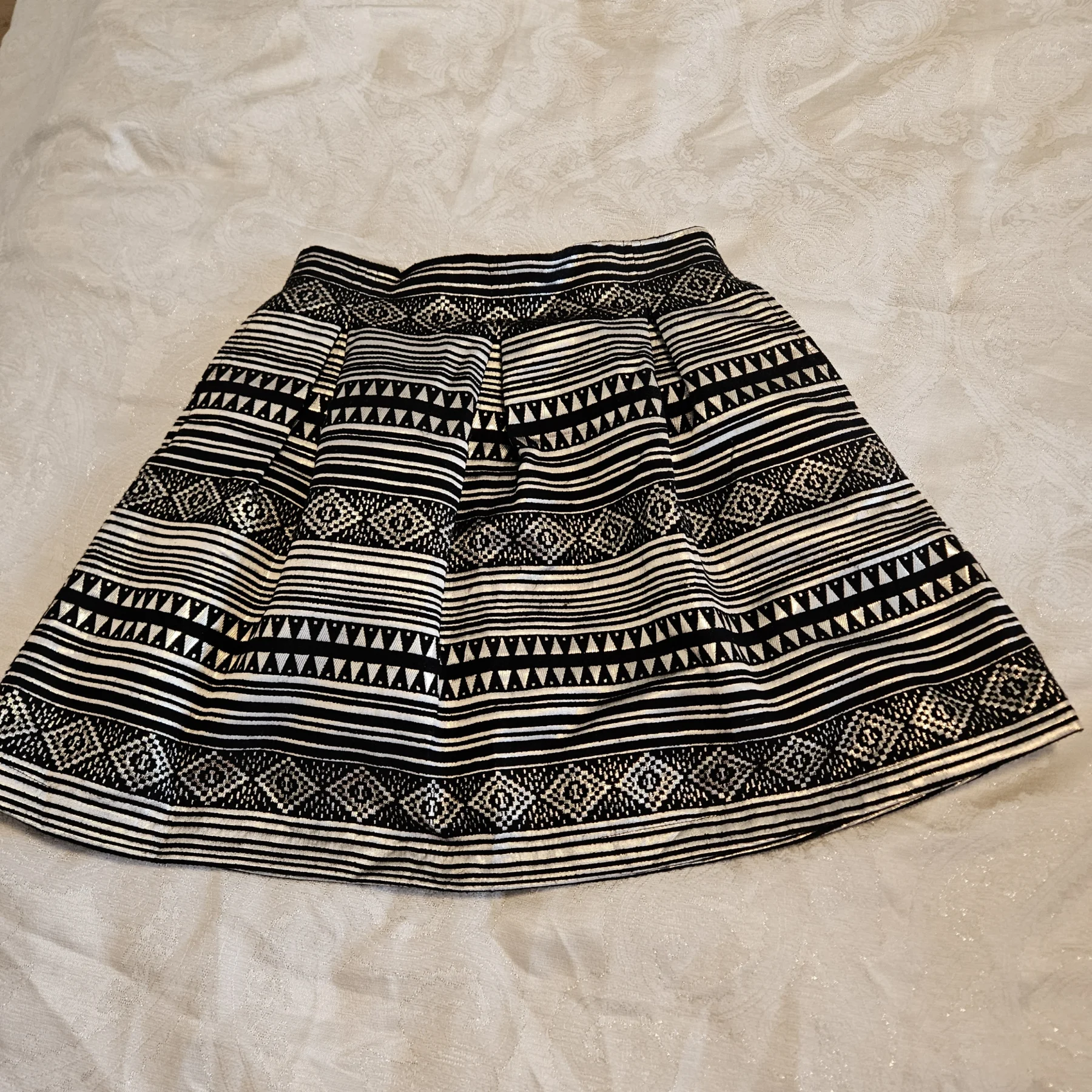 Simons skirt with black and gold Aztec patterns Twik seconde main
