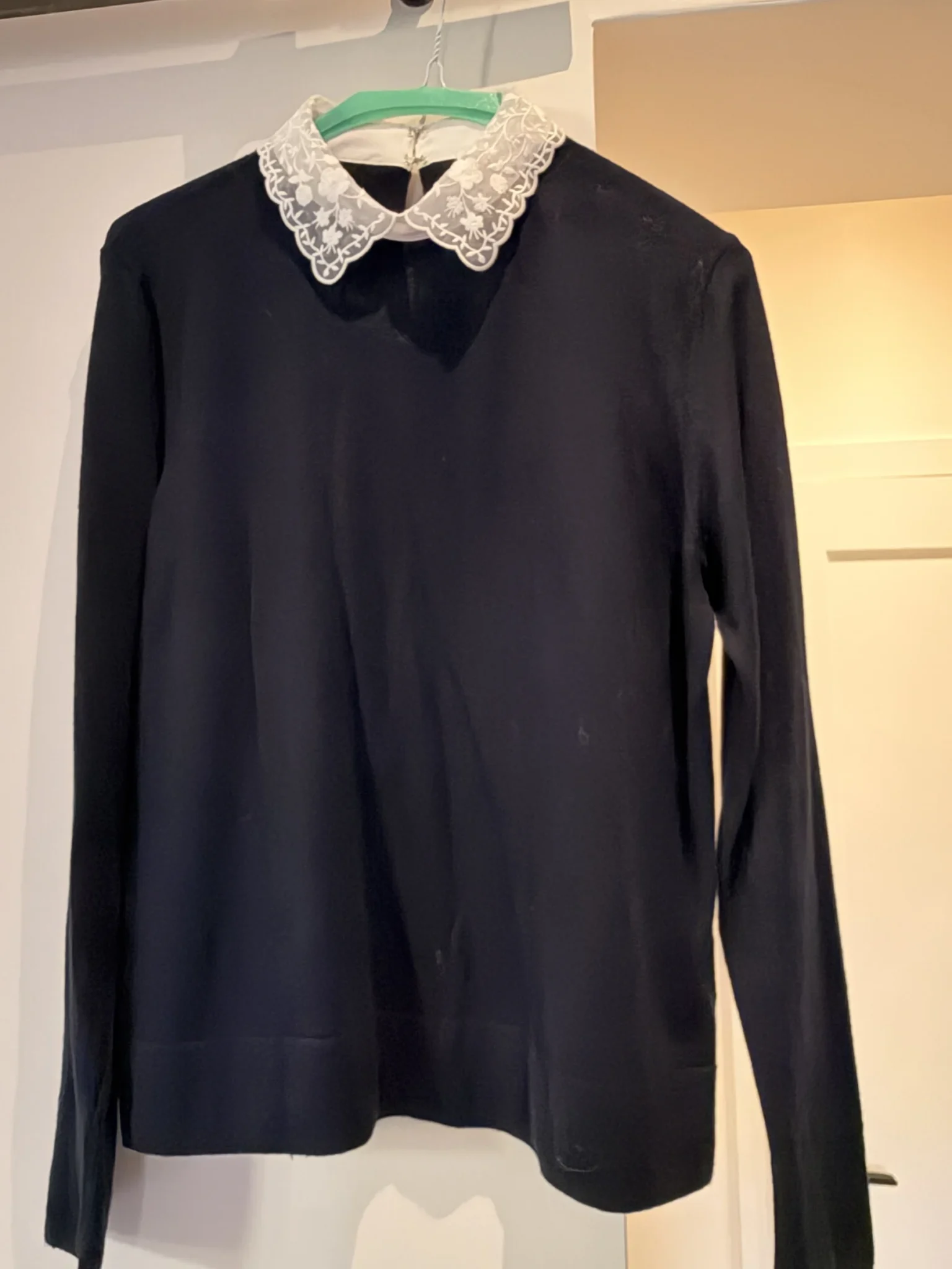 Featured image for Jumper with a lace collar