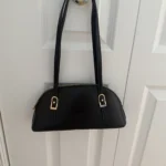 Featured thumbnail for Black handbag, as good as new