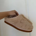 Featured thumbnail for Roxy mules with pale pink and brown fur, size 40 – 9