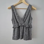 Featured thumbnail for Striped, ruffled, wrap-around sleeveless top
