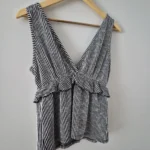 Thumbnail for Striped, ruffled, wrap-around sleeveless top