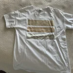Featured thumbnail for T-shirt chic presque neuf