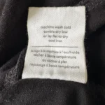Thumbnail for Sweater with an opening at the shoulder