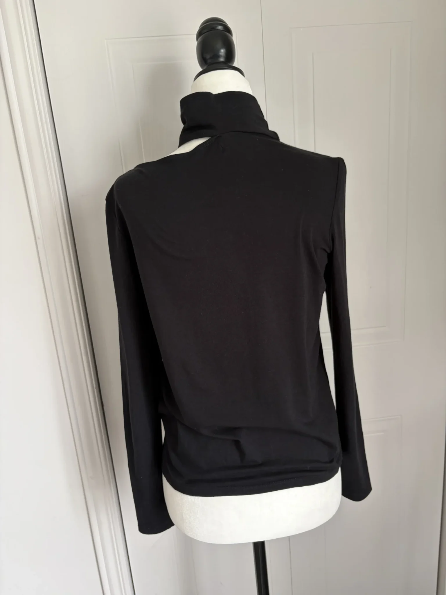 Image for Sweater with an opening at the shoulder