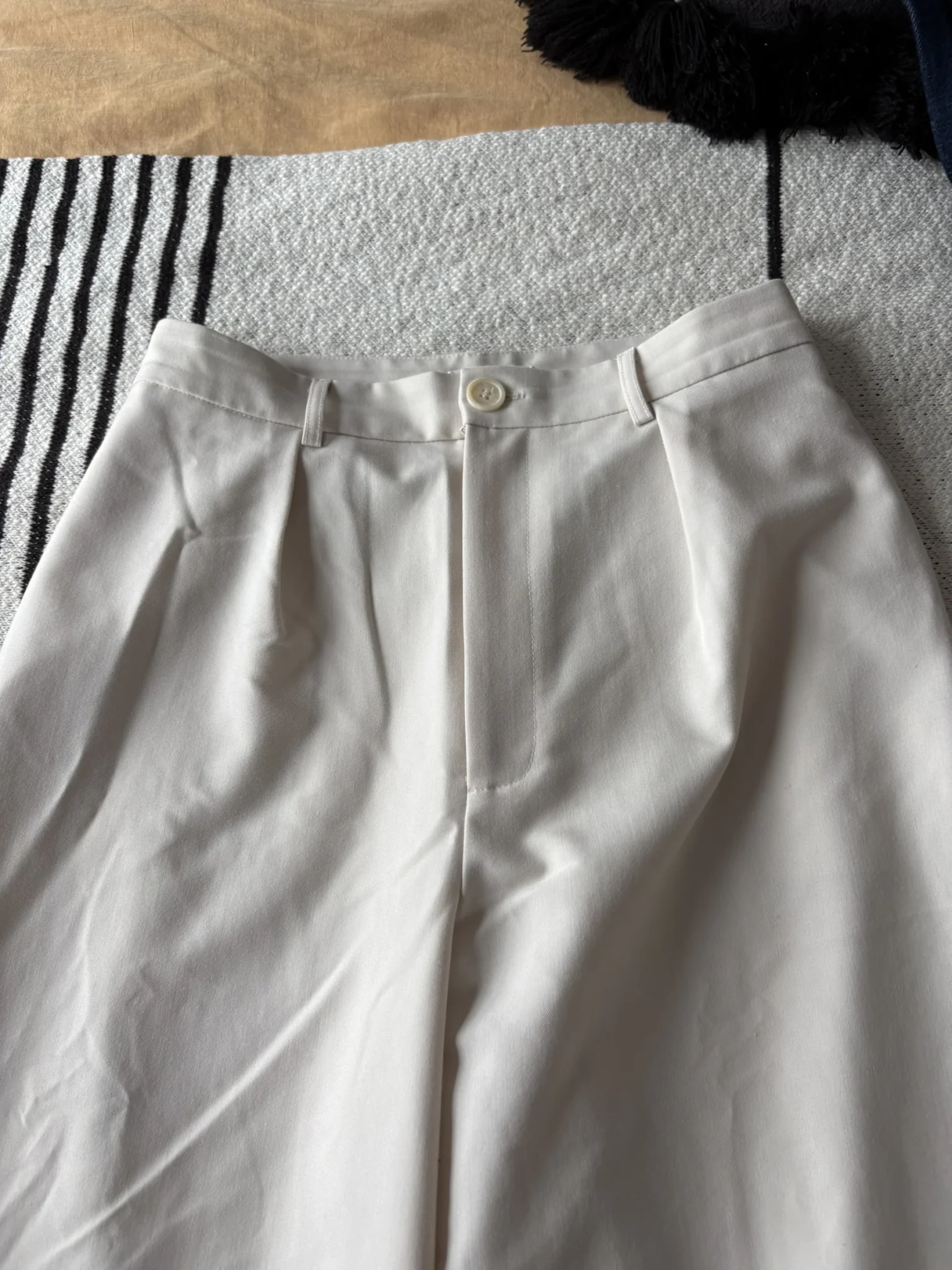 Featured image for Beige trousers